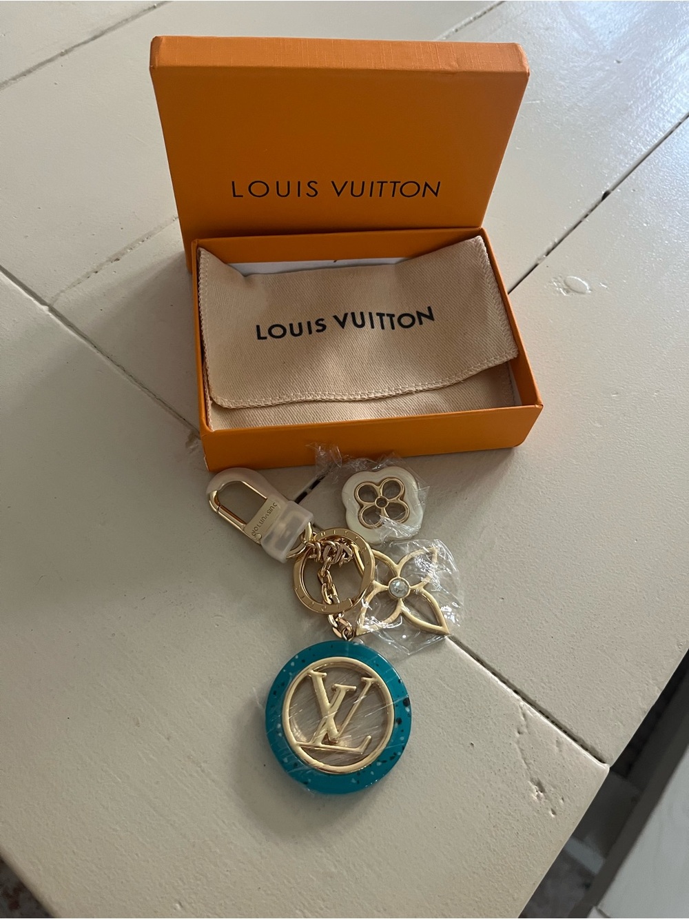 Louis Vuitton Turquoise and Gold Logo Key Charm